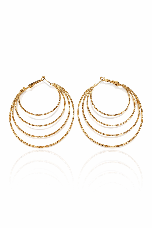 Grandes créoles intemporelles en laiton doré au fini lumineux